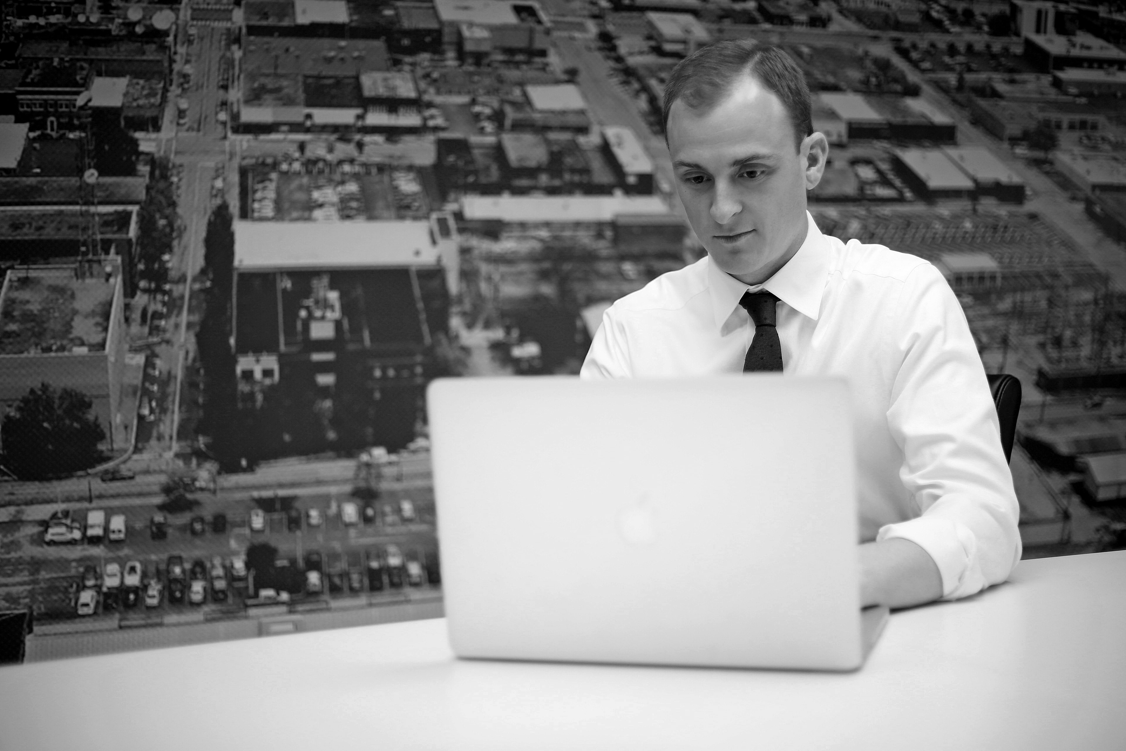 Ben Powers, Nashville attorney, working on a laptop